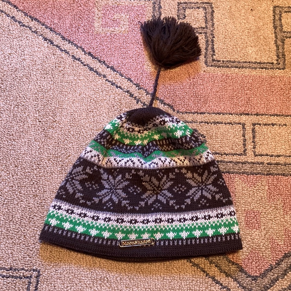 Winter hat by Moonshadow with pom. Like new, very comfy!